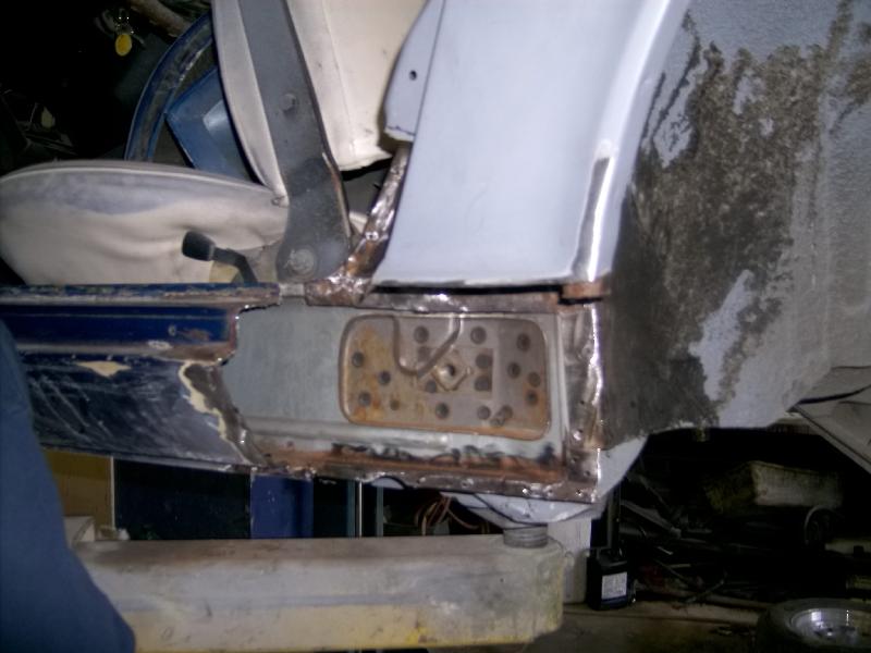 GEDC0356 Driver side door area cut out rusty metal and fabricate and weld new piece.